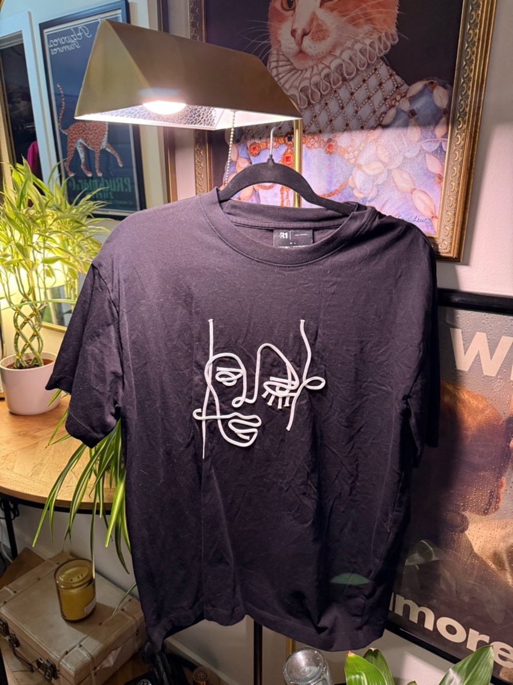 Black Graphic Tee with White Abstract Face Simons